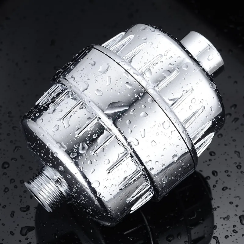 The Showerkind shower filter: a short chrome cylinder with a threaded end, wet with water drops