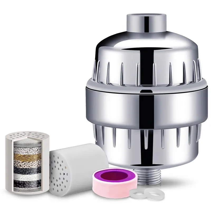 The filter with a cartridge cut open to show its layers of filter media, a whole cartridge, thread tape and two washers